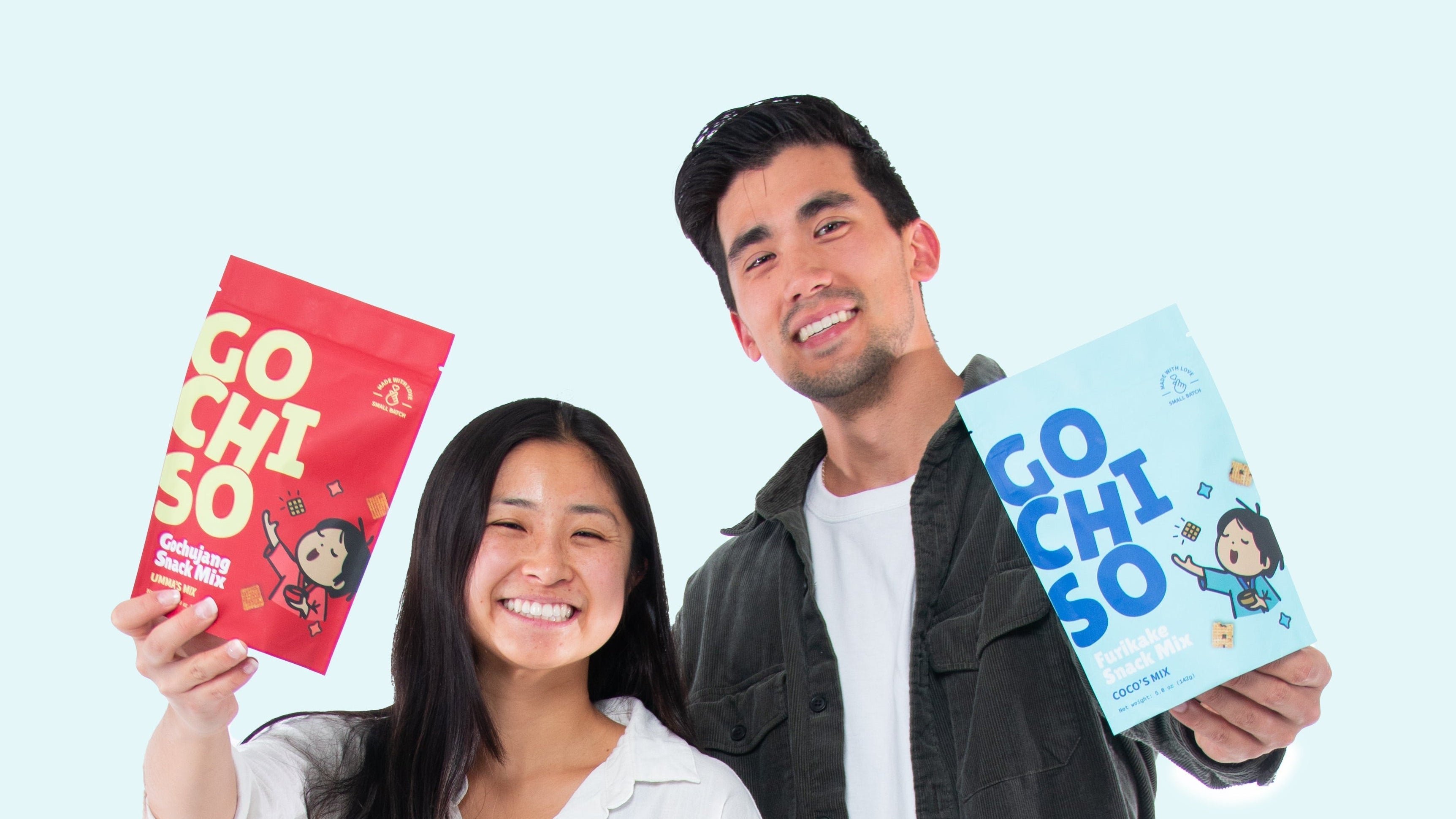 Gochiso founders Kira and Brandon holding snack mix