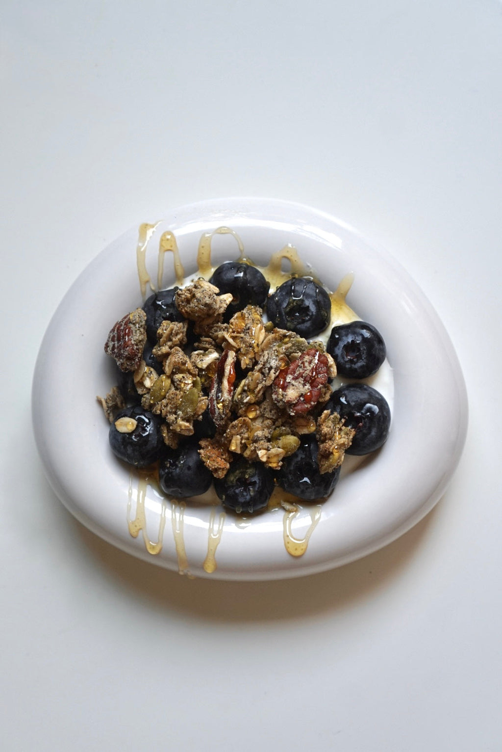 Black Sesame granola clusters by Nomi Crunch