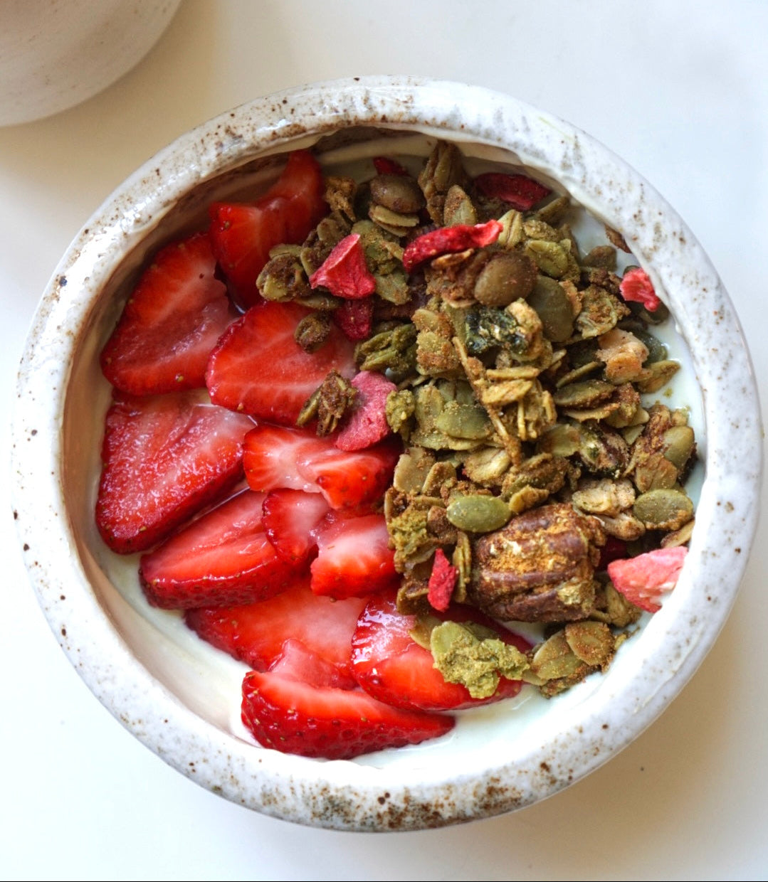 Strawberry Matcha granola clusters by Nomi Crunch