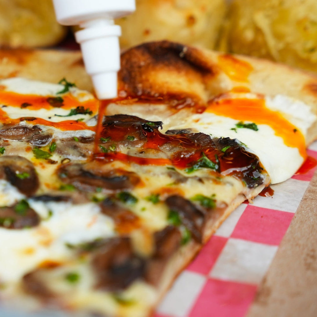 SMÁLÀ Chili Oil drizzled on pizza